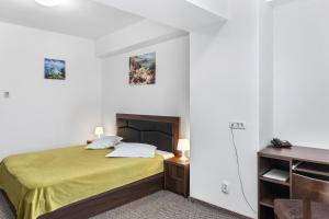 Postel nebo postele na pokoji v ubytování Lina Hotel