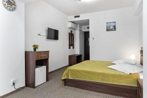 Postel nebo postele na pokoji v ubytování Lina Hotel