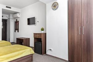 TV a/nebo společenská místnost v ubytování Lina Hotel