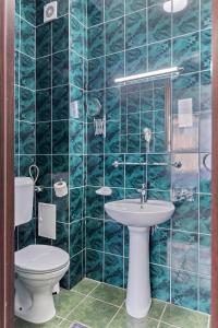 Koupelna v ubytování Lina Hotel