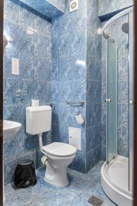 Koupelna v ubytování Lina Hotel