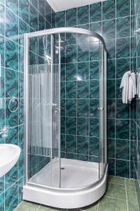 Koupelna v ubytování Lina Hotel