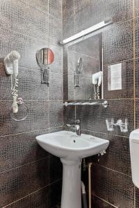 Koupelna v ubytování Lina Hotel