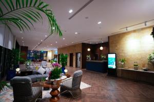 Lobby o reception area sa NAS Hotel