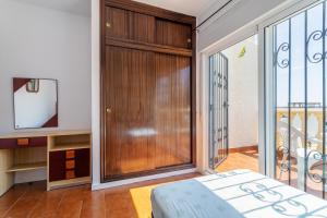 Ένα ή περισσότερα κρεβάτια σε δωμάτιο στο Bungalow Calle Altea