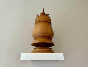 a wooden trophy with a crown on top of a shelf at DIMORA VERGER in Aosta