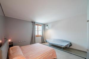 Un pat sau paturi într-o cameră la P&P Luxury Apartment