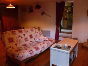 Posezení v ubytování Gragny Authentique Maison Montagne + 2 fotografie