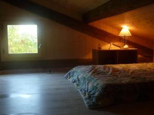 Postel nebo postele na pokoji v ubytování Gragny Authentique Maison Montagne