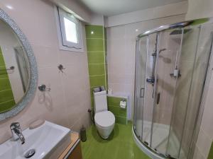 Koupelna v ubytování GreenHill Holiday Suites