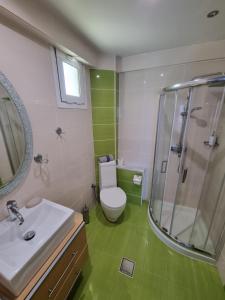 Koupelna v ubytování GreenHill Holiday Suites