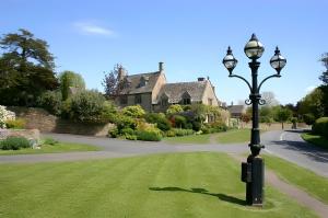 a street light in front of a house at The Thatch in Chipping Campden