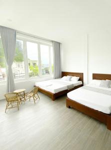 Postel nebo postele na pokoji v ubytování Hideaway Homestay