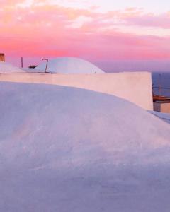 a painting of a skateboard ramp at sunset at Dammuso Pantelleria - Fiori D'Ossidiana in Pantelleria