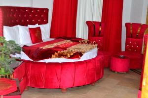 Postelja oz. postelje v sobi nastanitve Royal Galaxy Lodge