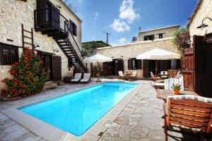 Bazén v ubytování Leonidas Village Houses nebo v jeho okolí