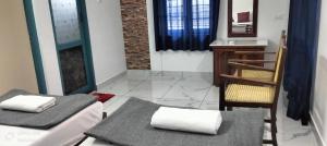 Guestland Homestay客房内的一张或多张床位