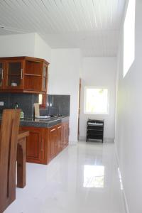 Kuchyň nebo kuchyňský kout v ubytování Villa Janaliya