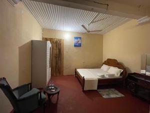 Un pat sau paturi într-o cameră la SAFARI