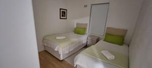 Postel nebo postele na pokoji v ubytování Delantero Unit 268 Beach Club + 7 fotografií