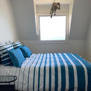 Posteľ alebo postele v izbe v ubytovaní Appartement standing vue Mer