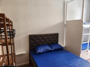 Fujima Hostel客房内的一张或多张床位