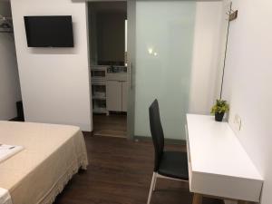 TV a/nebo společenská místnost v ubytování Cabildo Castelar + 11 fotografií