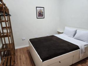 Fujima Hostel客房内的一张或多张床位