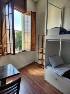 Fujima Hostel客房内的一张或多张床位