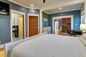 a bedroom with a bed in a room at Contemporary Cohoes Retreat with Electric Fireplace! in Cohoes