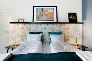 Postel nebo postele na pokoji v ubytování Årslev B&B
