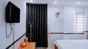 TV a/nebo společenská místnost v ubytování Hoài Thu Hotel Vũng Tàu + 9 fotografií
