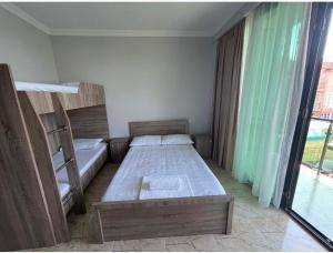 Postel nebo postele na pokoji v ubytování Hotel Mia