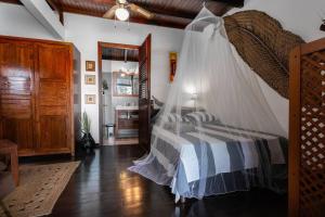 Letto o letti in una camera di Appartement Alizé Vue Imprenable Sur La mer
