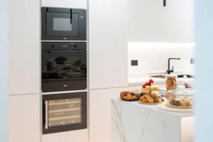 Dapur atau dapur kecil di Cavaedium Guest House