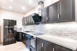 Η κουζίνα ή μικρή κουζίνα στο Hyper centre, Premium, spacieux appartement haussmannien
