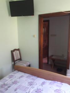 Llit o llits en una habitació de MS Stojic