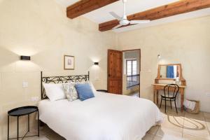 Voodi või voodid majutusasutuse Gozo Escape toas