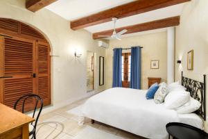 Voodi või voodid majutusasutuse Gozo Escape toas