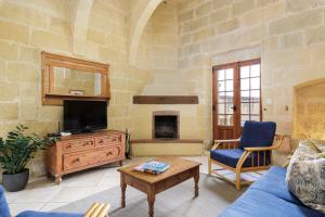 Televiisor ja/või meelelahutuskeskus majutusasutuses Gozo Escape