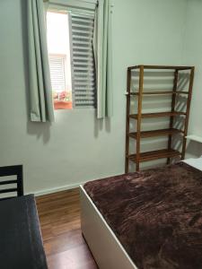 Fujima Hostel客房内的一张或多张床位