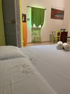 Postel nebo postele na pokoji v ubytování A Casa di Lu