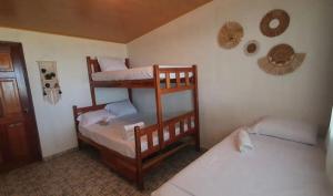 - une chambre avec 2 lits superposés dans l'établissement Bella Vista Hotel Boutique, à San Miguel