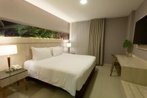 Letto o letti in una camera di Hotel Soratama