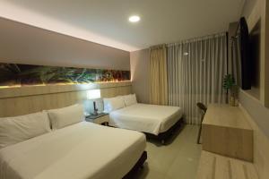 Letto o letti in una camera di Hotel Soratama