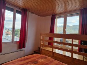 Postel nebo postele na pokoji v ubytování Séjour confortable à l'appartement à Bellevue