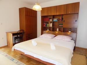 Łóżko lub łóżka w pokoju w obiekcie Villa Maristika