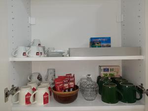 A kitchen or kitchenette at APARTMAN VIAGGIO i PARKING GARAŽA