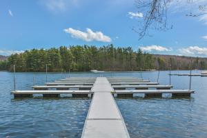 a dock in the middle of a lake at Keep Calm and Lake On in Swanton