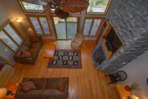 an overhead view of a living room with a stone fireplace at Keep Calm and Lake On in Swanton